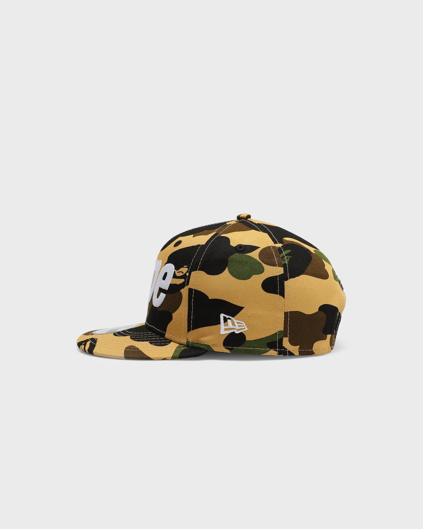 A Bathing Ape 1st Camo Bape x New Era Snapback Yellow